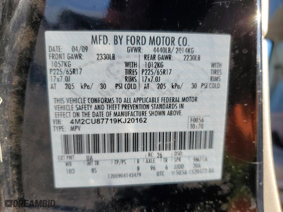 2009 Mercury Mariner Premier with VIN 4M2CU87719KJ20162, listed as a Copart auction lot 84315594 with 143,548 mi miles and Salvage Title. Bid and sale history available at carsss.com. Image 14.