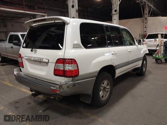 2006 Toyota Land Cruiser with VIN JTEHT05J562097054, listed as a IAAI auction lot 41539648 with 286,946 mi miles. Bid and sale history available at carsss.com. Image 4.