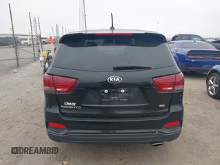 2019 Kia Sorento LX with VIN 5XYPG4A34KG579484, listed as a IAAI auction lot 40971250 with 142,327 mi miles. Bid and sale history available at carsss.com. Image 16.