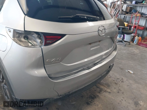 2018 Mazda CX-5 Grand Touring with VIN JM3KFBDM4J0350420, listed as a IAAI auction lot 41881566 with 96,515 mi miles. Bid and sale history available at carsss.com. Image 6.