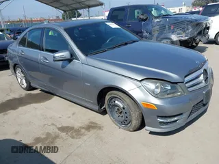 2012 Mercedes-Benz C-Class C 250 Sport with VIN WDDGF4HB2CA619424, listed as a IAAI auction lot 42087550 with 96,962 mi miles. Bid and sale history available at carsss.com. Image 1.