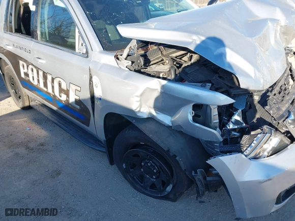 2018 Chevrolet Tahoe Commercial with VIN 1GNSKDEC1JR340887, listed as a IAAI auction lot 41044038 with 99,500 mi miles. Bid and sale history available at carsss.com. Image 18.