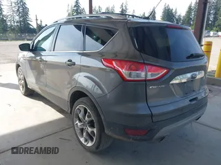 2014 Ford Escape Titanium with VIN 1FMCU9JX0EUC45801, listed as a IAAI auction lot 42121561 with 80,217 mi miles and . Bid and sale history available at DreamBid. Image 3.
