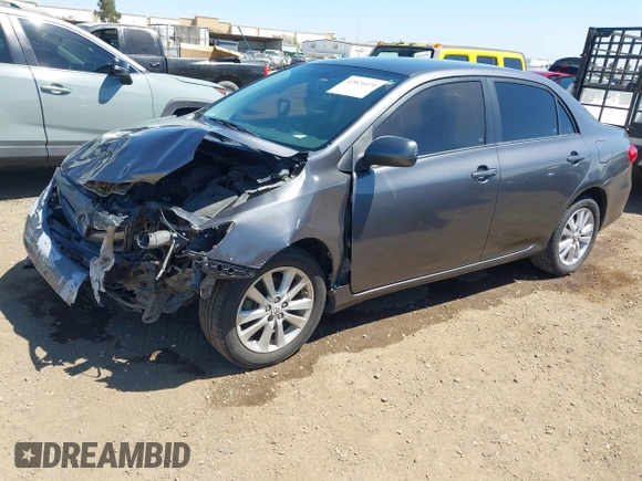 2011 Toyota Corolla L with VIN 2T1BU4EE7BC738640, listed as a IAAI auction lot 42024474 with 164,322 mi miles. Bid and sale history available at carsss.com. Image 2.