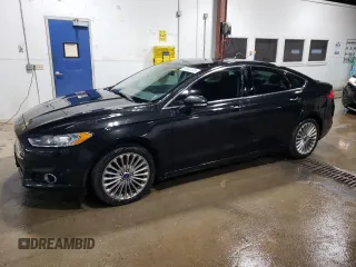 2014 Ford Fusion Titanium с VIN 3FA6P0K98ER304398, выставлен на аукционе Copart как лот 61048165 с пробегом 160 077 миль миль и Чистый • Clean title. История ставок и продаж доступна на DreamBid. Изображение 1.