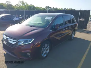 2019 Honda Odyssey EX z VIN 5FNRL6H5XKB125738, wystawiony jako IAAI lot #42019210 z przebiegiem 68 700 mil mil oraz . Historia ofert i sprzedaży dostępna na DreamBid. Obrazek 2.