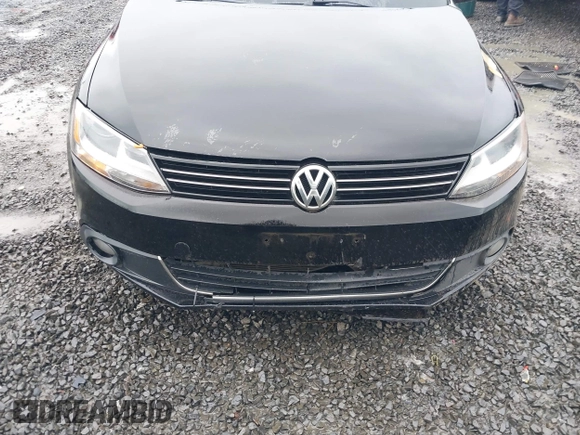 2014 Volkswagen Jetta TDI w/Premium with VIN 3VWLL7AJ1EM406360, listed as a IAAI auction lot 41857580 with 93,333 mi miles and . Bid and sale history available at DreamBid. Image 6.