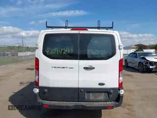 2019 Ford Transit z VIN 1FTYR2ZM1KKA68132, wystawiony jako IAAI lot #42094241 z przebiegiem 154 243 mil mil oraz . Historia ofert i sprzedaży dostępna na DreamBid. Obrazek 16.