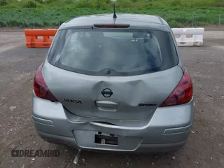 2012 Nissan Versa S z VIN 3N1BC1CP7CK800017, wystawiony jako IAAI lot #42270666 z przebiegiem 152 790 mil mil oraz . Historia ofert i sprzedaży dostępna na DreamBid. Obrazek 16.