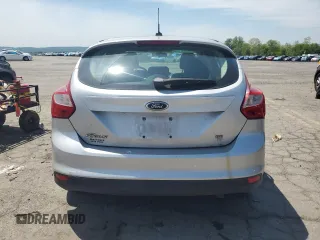 2012 Ford Focus SE z VIN 1FAHP3K2XCL270196, wystawiony jako Copart lot #57319575 z przebiegiem 80 364 mil mil oraz Szkoda całkowita • Salvage title. Historia ofert i sprzedaży dostępna na DreamBid. Obrazek 6.