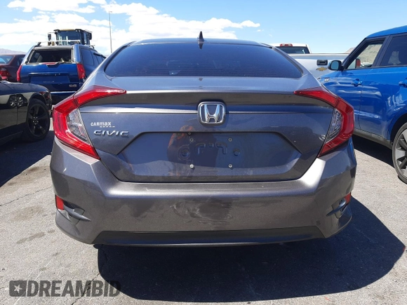 2018 Honda Civic EX с VIN 19XFC2F79JE040927, выставлен на аукционе Copart как лот 55696165 с пробегом 58 696 миль миль и Списание • Salvage title. История ставок и продаж доступна на DreamBid. Изображение 6.