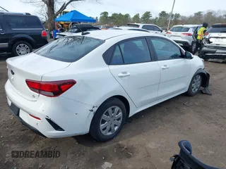 2021 Kia Rio LX with VIN 3KPA24AD7ME420438, listed as a IAAI auction lot 42030510 with 13,927 mi miles. Bid and sale history available at carsss.com. Image 4.