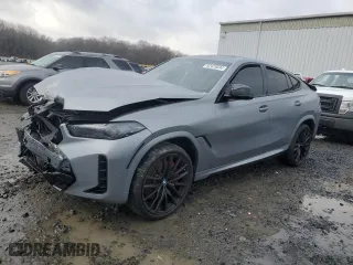 2025 BMW X6 M60i with VIN 5UX43EX01S9X34140, listed as a Copart auction lot 82425694 with 6,844 mi miles and Salvage Title. Bid and sale history available at carsss.com. Image 1.