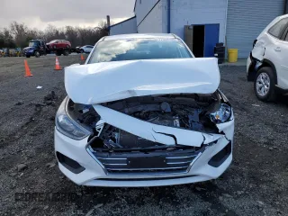 2019 Hyundai Accent SE with VIN 3KPC24A33KE079875, listed as a Copart auction lot 77388893 with 76,385 mi miles. Bid and sale history available at carsss.com. Image 5.