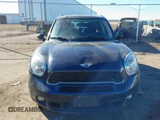 2011 MINI Countryman S with VIN WMWZC5C54BWL55124, listed as a IAAI auction lot 41666874 with 197,656 mi miles and . Bid and sale history available at DreamBid. Image 6.