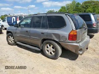 2005 GMC Envoy SLT z VIN 1GKDS13S652344365, wystawiony jako Copart lot #52745125 z przebiegiem 131 099 mil mil oraz Szkoda całkowita • Salvage title. Historia ofert i sprzedaży dostępna na DreamBid. Obrazek 2.