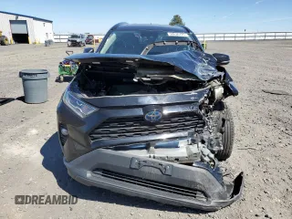 2020 Toyota RAV4 Hybrid XLE with VIN 2T3RWRFV0LW091705, listed as a Copart auction lot 58636775 with 68,534 mi miles and Salvage title. Bid and sale history available at DreamBid. Image 5.