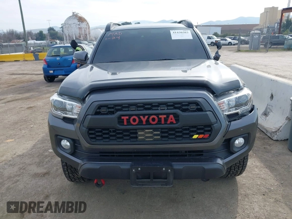 2021 Toyota Tacoma 4WD SR5 with VIN 3TMDZ5BN5MM110218, listed as a IAAI auction lot 41430303 with 47,781 mi miles. Bid and sale history available at carsss.com. Image 12.