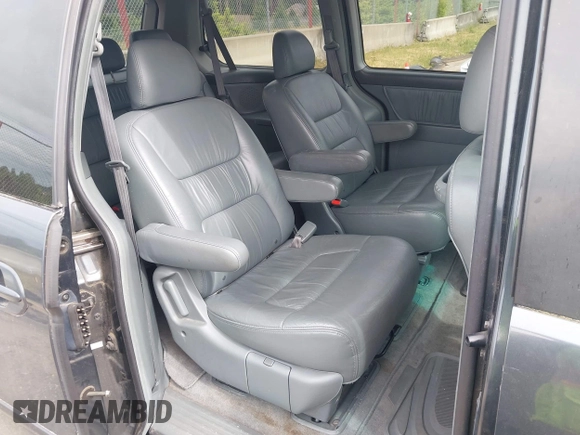 2004 Honda Odyssey EX-L with VIN 5FNRL18064B066763, listed as a IAAI auction lot 42588622 with 499,993 mi miles and . Bid and sale history available at DreamBid. Image 8.