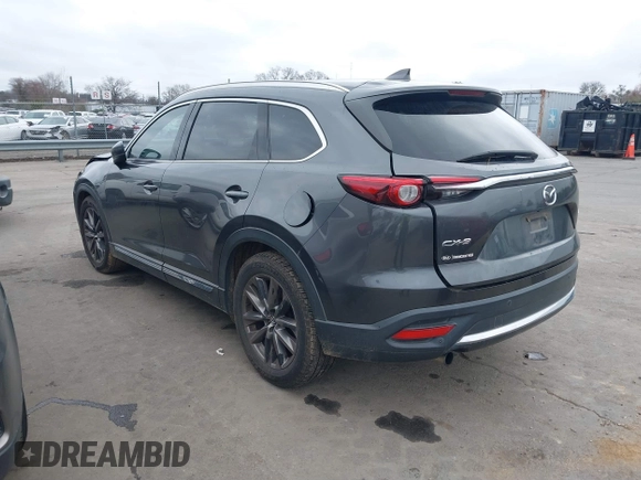 2016 Mazda CX-9 Grand Touring with VIN JM3TCADY4G0111310, listed as a IAAI auction lot 41532851 with 178,907 mi miles and . Bid and sale history available at DreamBid. Image 3.