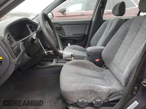 2002 Hyundai Elantra GLS with VIN KMHDN45D42U292698, listed as a Copart auction lot 52349925 with 99,424 mi miles and Salvage title. Bid and sale history available at DreamBid. Image 7.