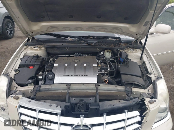 2011 Cadillac DTS z VIN 1G6KA5E65BU139507, wystawiony jako IAAI lot #42236497 z przebiegiem 118 332 mil mil oraz . Historia ofert i sprzedaży dostępna na DreamBid. Obrazek 10.