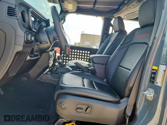 2024 Jeep Wrangler Rubicon X with VIN 1C4RJXFGXRW247781, listed as a Copart auction lot 64393745 with 2,661 mi miles and Salvage title. Bid and sale history available at DreamBid. Image 7.