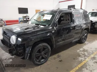 2014 Jeep Patriot Latitude with VIN 1C4NJPFB4ED645447, listed as a IAAI auction lot 41851597 with 128,319 mi miles and . Bid and sale history available at carsss.com. Image 2.