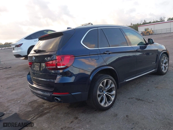 2017 BMW X5 sDrive35i with VIN 5UXKR2C53H0U21044, listed as a IAAI auction lot 41946564 with 54,585 mi miles. Bid and sale history available at carsss.com. Image 4.