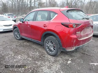 2018 Mazda CX-5 Sport with VIN JM3KFBBM0J0451246, listed as a IAAI auction lot 41698535 with 172,513 mi miles. Bid and sale history available at carsss.com. Image 3.