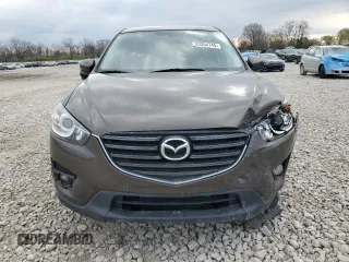 2016 Mazda CX-5 Touring with VIN JM3KE2CY8G0902131, listed as a Copart auction lot 53354745 with 123,474 mi miles and Salvage Title. Bid and sale history available at carsss.com. Image 5.
