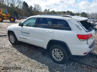 2018 Jeep Grand Cherokee Laredo E with VIN 1C4RJFAG8JC424609, listed as a IAAI auction lot 41124689 with 101,643 mi miles. Bid and sale history available at carsss.com. Image 3.