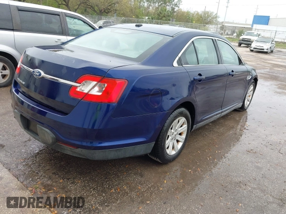 2011 Ford Taurus SE with VIN 1FAHP2DW7BG128857, listed as a IAAI auction lot 41705643 with 163,589 mi miles. Bid and sale history available at carsss.com. Image 4.