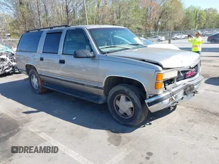 1999 GMC Suburban with VIN 3GKFK16R4XG514928, listed as a IAAI auction lot 41934636 with 245,010 mi miles and . Bid and sale history available at DreamBid. Image 1.