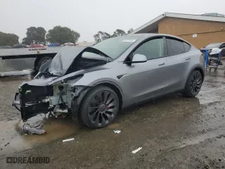 2025 Tesla Model Y Performance with VIN 7SAYGDEF8SF264738, listed as a Copart auction lot 84975054 with 334 mi miles and Salvage Title. Bid and sale history available at carsss.com. Image 1.