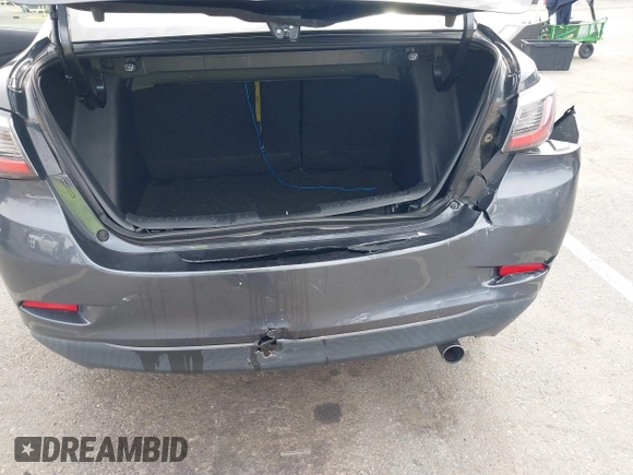 2018 Toyota Yaris with VIN 3MYDLBYV2JY321213, listed as a IAAI auction lot 41890815 with 94,089 mi miles and . Bid and sale history available at DreamBid. Image 6.
