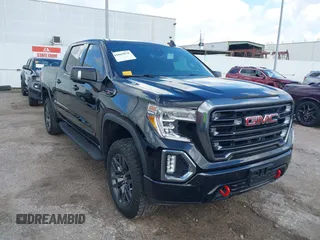 2021 GMC Sierra 1500 AT4 z VIN 1GTP9EELXMZ304412, wystawiony jako IAAI lot #41069878 z przebiegiem 48 987 mil mil oraz . Historia ofert i sprzedaży dostępna na DreamBid. Obrazek 1.