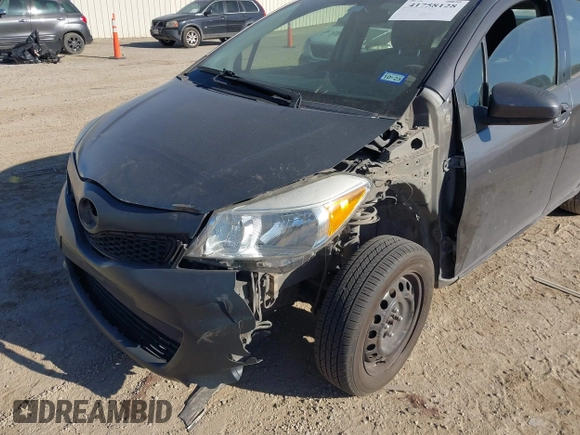 2013 Toyota Yaris L with VIN JTDKTUD39DD543776, listed as a IAAI auction lot 41758128 with 228,595 mi miles. Bid and sale history available at carsss.com. Image 6.