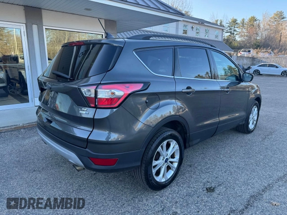 2018 Ford Escape SE with VIN 1FMCU9GD8JUA76991, listed as a Copart auction lot 52815245 with 213,827 mi miles and Clean Title. Bid and sale history available at carsss.com. Image 4.