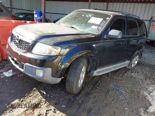 2011 Mazda Tribute Sport with VIN 4F2CY9C7XBKM06202, listed as a IAAI auction lot 41281197 with 195,443 mi miles and . Bid and sale history available at DreamBid. Image 2.