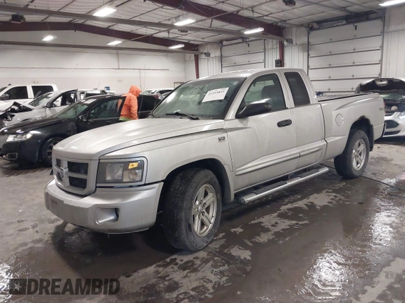 2010 Dodge Dakota with VIN 1D7CW3BP7AS103645, listed as a IAAI auction lot 41514841 with 158,125 mi miles and . Bid and sale history available at DreamBid. Image 18.