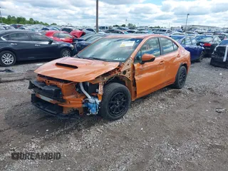 2022 Subaru WRX Premium with VIN JF1VBAF6XN9026454, listed as a IAAI auction lot 42199908 with 10,659 mi miles and . Bid and sale history available at DreamBid. Image 2.