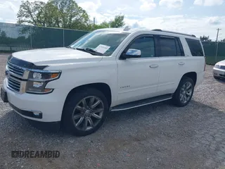 2016 Chevrolet Tahoe LTZ z VIN 1GNSKCKC7GR243183, wystawiony jako IAAI lot #41939209 z przebiegiem 81 903 mil mil oraz . Historia ofert i sprzedaży dostępna na DreamBid. Obrazek 18.