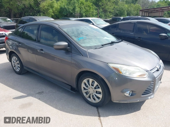 2012 Ford Focus SE z VIN 1FAHP3F24CL294391, wystawiony jako IAAI lot #42545359 z przebiegiem 190 904 mil mil oraz . Historia ofert i sprzedaży dostępna na DreamBid. Obrazek 1.