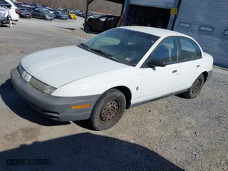 1999 Saturn SL with VIN 1G8ZH5282XZ178928, listed as a IAAI auction lot 41758412 with 249,418 mi miles. Bid and sale history available at carsss.com. Image 2.