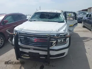 2016 Chevrolet Tahoe Commercial z VIN 1GNLCDEC9GR299693, wystawiony jako IAAI lot #42630221 z przebiegiem 127 081 mil mil oraz . Historia ofert i sprzedaży dostępna na DreamBid. Obrazek 12.