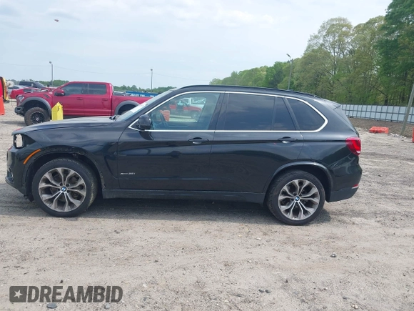 2016 BMW X5 xDrive35i z VIN 5UXKR0C55G0P26466, wystawiony jako IAAI lot #42005793 z przebiegiem 200 889 mil mil oraz . Historia ofert i sprzedaży dostępna na DreamBid. Obrazek 14.