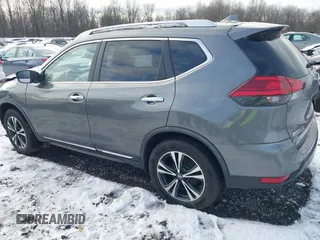 2017 Nissan Rogue SL with VIN JN8AT2MV7HW271485, listed as a IAAI auction lot 41100772 with 106,965 mi miles. Bid and sale history available at carsss.com. Image 3.