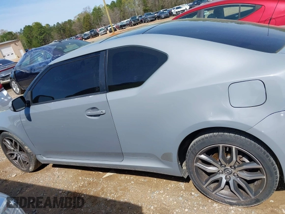 2014 Scion tC with VIN JTKJF5C78E3075164, listed as a IAAI auction lot 41922609 with 142,064 mi miles. Bid and sale history available at carsss.com. Image 15.