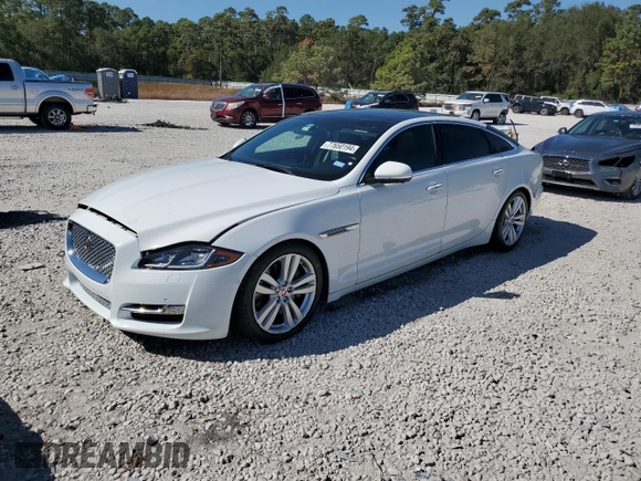 2016 Jaguar XJ Portfolio with VIN SAJWA2G79G8W00955, listed as a Copart auction lot 77650194 with 60,515 mi miles and Clean title. Bid and sale history available at DreamBid. Image 1.